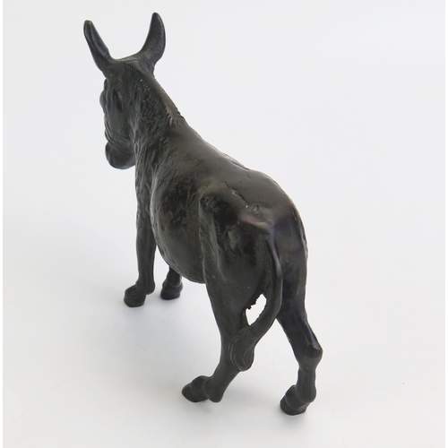 1547 - A bronze study of a donkey, unsigned, 21cm long.