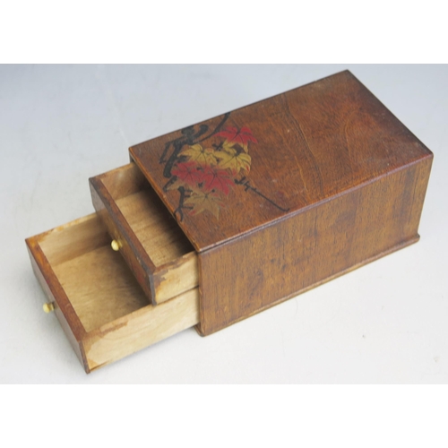 1560 - A treen rectangular box with sliding top, 9cm long, together with two other treen boxes. (3).