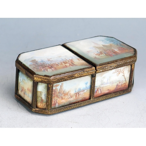 1563 - A late 18th/early 19th century gilt brass trinket box, of rectangular outline with canted corners, w... 