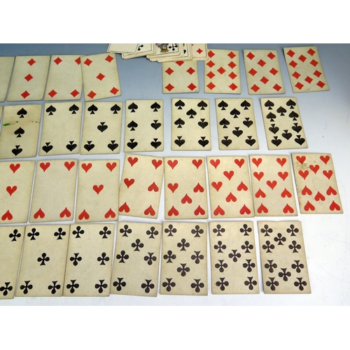 1564 - A 19th century German castle  part set of playing cards, 50/52, together with two other 19th century... 