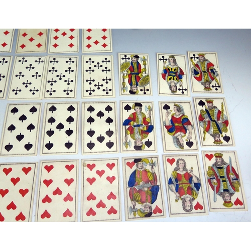 1564 - A 19th century German castle  part set of playing cards, 50/52, together with two other 19th century... 