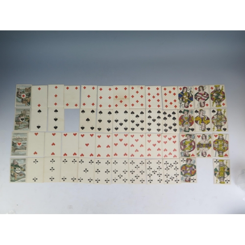 1564 - A 19th century German castle  part set of playing cards, 50/52, together with two other 19th century... 