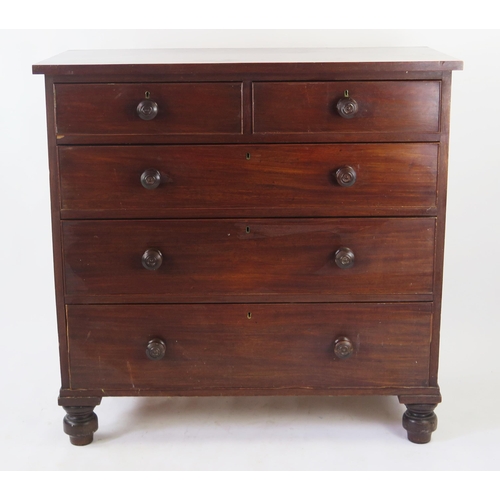 1572 - A 19th century mahogany chest containing two short and three long graduated drawers, on bun feet, 10... 