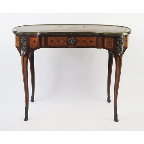 1586 - A French kingwood, rosewood an inlaid writing table of kidney-shaped outline, with tooled leather wr... 