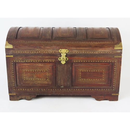 1587 - A hardwood and brass inlaid chest, with domed triple panelled hinged lid, with panelled front and si... 