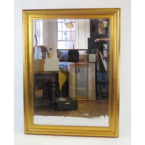 1593 - A modern gilt frame mirror with rectangular bevelled mirror plate overall size, 150cm x 114cm.