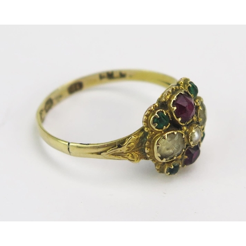 16 - A Victorian 12ct Gold and Paste Cluster Ring with chased foliate decoration to the shoulders, 9.75mm... 