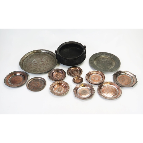 1600 - Two Persian metal circular dishes, twin handled bowl and assorted copper plates.