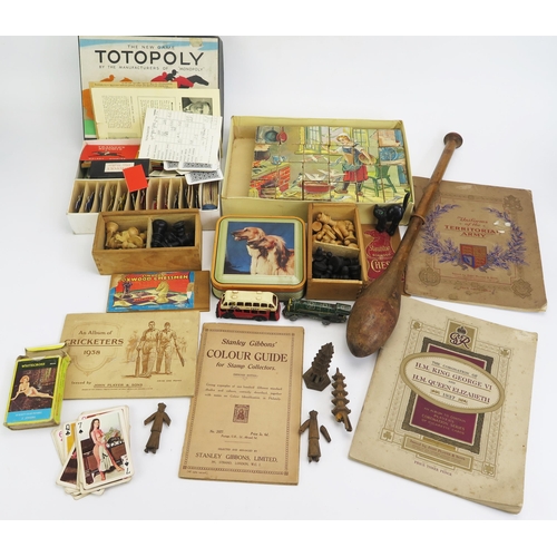 1609A - A collection of assorted children's toys including Staunton pattern chess sets, Totopoly pieces, bui... 