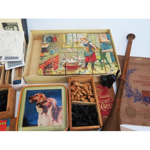 1609A - A collection of assorted children's toys including Staunton pattern chess sets, Totopoly pieces, bui... 