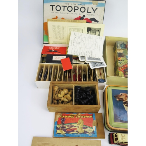 1609A - A collection of assorted children's toys including Staunton pattern chess sets, Totopoly pieces, bui... 