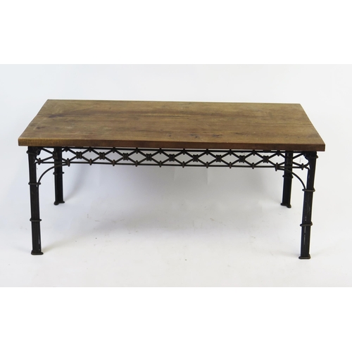 1637 - A wrought iron and hardwood conservatory table of rectangular outline, 110cm long, 61cm deep, 48cm h... 