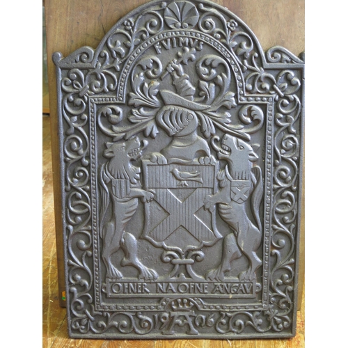 1638 - An 18th century style cast iron fireback, of arched outline with low relief armorial decoration, 77c... 