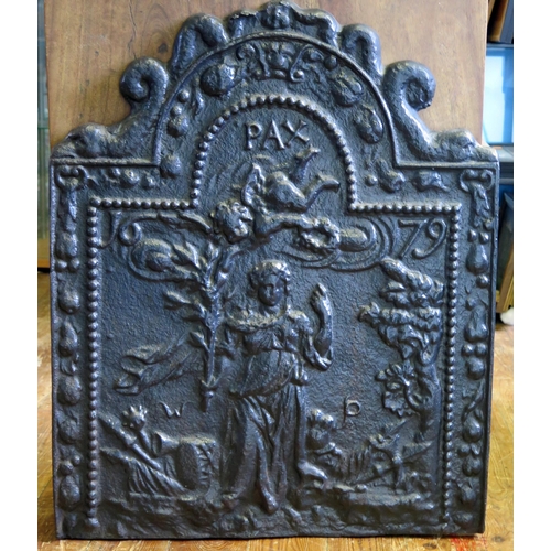 1639 - An 18th century style cast iron fireback, of arched outline decorated in low relief allegorical figu... 