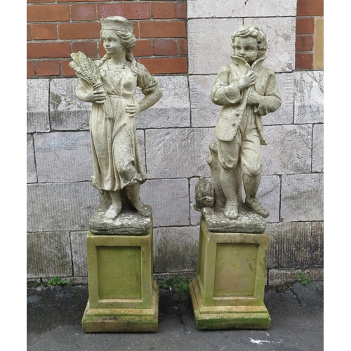 1642 - A pair of reconstituted stone statues representing the Autumn and Winter, each raised on a plinth ba... 