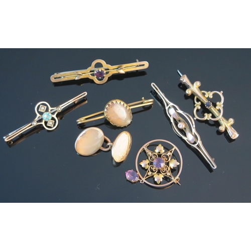 166 - Three 9ct Gold Brooches (6.43g), an amethyst mounted circular brooch with drop and one other (both K... 