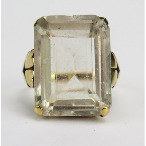 19 - A 9ct Gold and White Topaz Dress Ring, 19.5x14.7mm stone, size M, stamped 9CT, 8.45g. Stone A/F