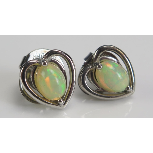 225 - A Pair of Silver and Opal Heart Shaped Studs