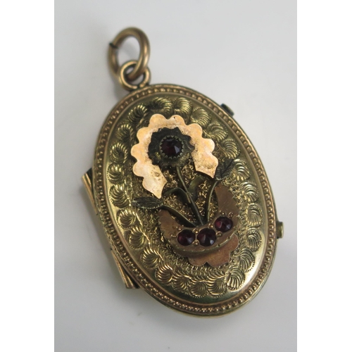 228 - An antique Gold Plated Locket, 40.2mm drop