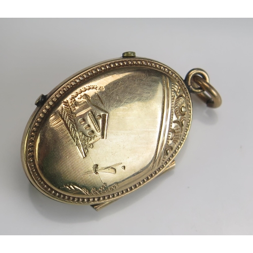 228 - An antique Gold Plated Locket, 40.2mm drop