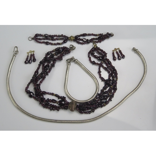 242 - A Precious White Metal Necklace and Bracelet Set (91g)and a garnet necklace, bracelet and pair of dr... 