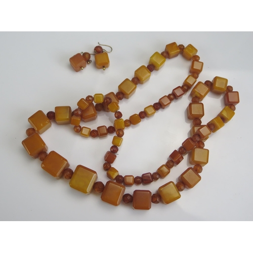 245 - A Pressed Amber Square Bead Necklace and earrings, 77.4g