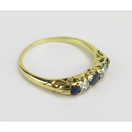 25 - An 18ct Gold, Sapphire, Diamond and Paste Ring, size N.5, 2.74g