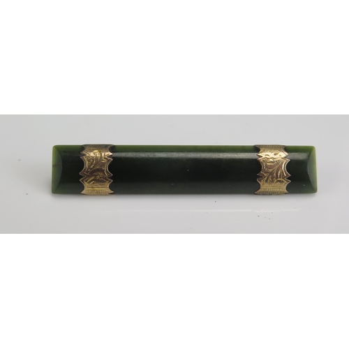 275 - A 9ct Gold and Nephrite Brooch, 50mm, stamped 9CT, 5.8g