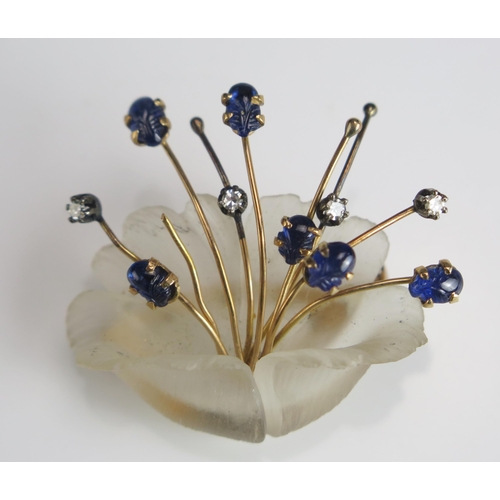 290 - An 18K Gold Carved Cabochon Sapphire and Diamond Foliate Spray Brooch articulated within a frosted g... 