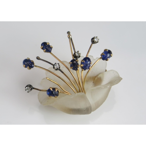 290 - An 18K Gold Carved Cabochon Sapphire and Diamond Foliate Spray Brooch articulated within a frosted g... 