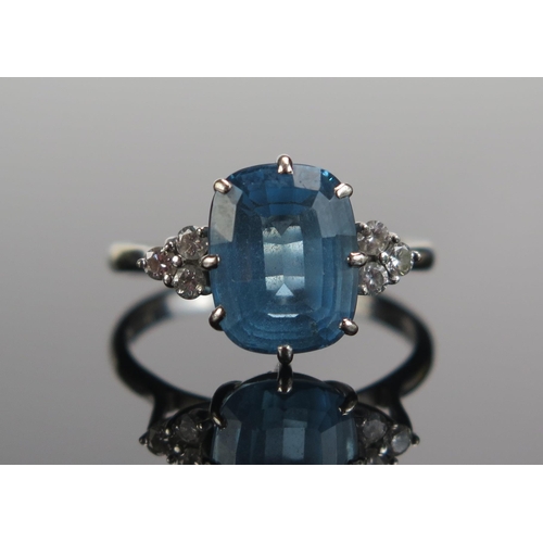 292 - An 18ct White Gold, Blue Topaz????? and Diamond Ring, 11.3x9mm principal stone, size S, hallmarked, ... 