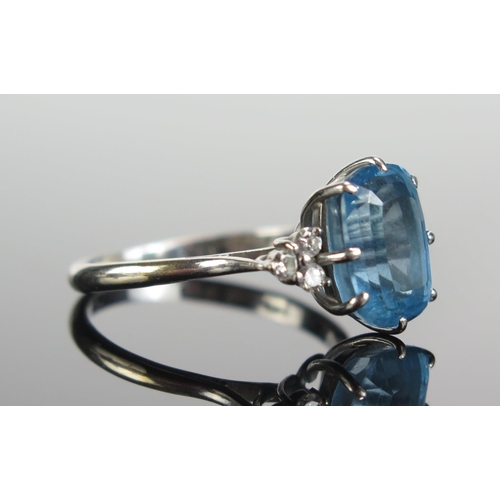 292 - An 18ct White Gold, Blue Topaz????? and Diamond Ring, 11.3x9mm principal stone, size S, hallmarked, ... 