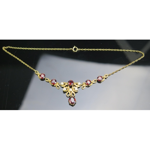 294 - A 9ct Gold, Garnet and Cultured Pearl Necklace, 15.75