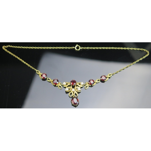 294 - A 9ct Gold, Garnet and Cultured Pearl Necklace, 15.75