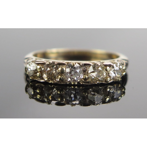 301 - An 18ct Gold and Diamond Five Stone Ring, c. 3.5mm principal stone, size M.25, stamped 18CT, 2.73g