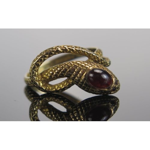 305 - A 9ct Gold and Garnet Snake Ring, size N.5, hallmarked, 3.15g