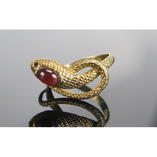 305 - A 9ct Gold and Garnet Snake Ring, size N.5, hallmarked, 3.15g