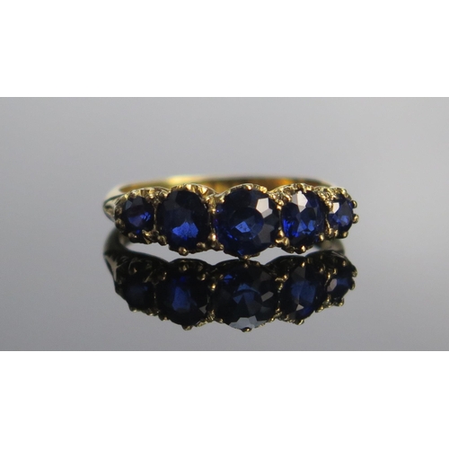 313 - An Antique 18ct Gold And Natural Sapphire Five Stone Ring, c. 5.3mm principal stone, size M.5, Londo... 