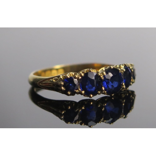 313 - An Antique 18ct Gold And Natural Sapphire Five Stone Ring, c. 5.3mm principal stone, size M.5, Londo... 