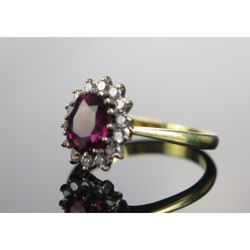 322 - An 18ct Gold, Ruby and Diamond Cluster Ring, 7.5x6.3mm principal stone, 12.46x10.5mm head, size N.5,... 