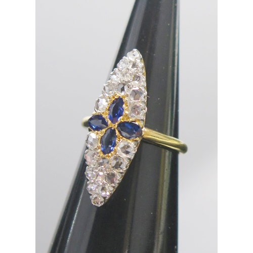 326 - A Sapphire and Rose Cut Diamond Marquis Ring in a high carat precious yellow metal setting, size K.7... 