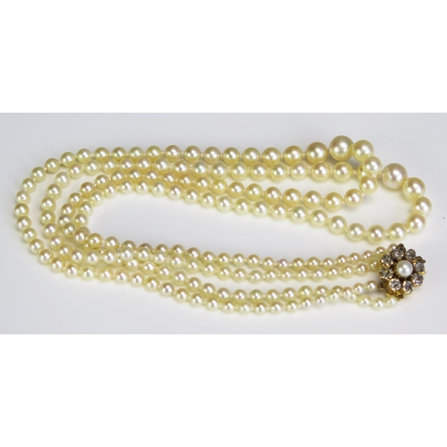 352 - A Graduated Pearl  or Cultured Pearl Twin Strand Necklace with 9ct gold and rose cut diamond clasp, ... 