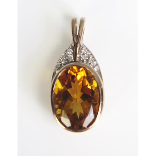 354 - A 9ct Rose Gold, Citrine and Diamond Pendant, 25.2mm drop, hallmarked, 4.2g