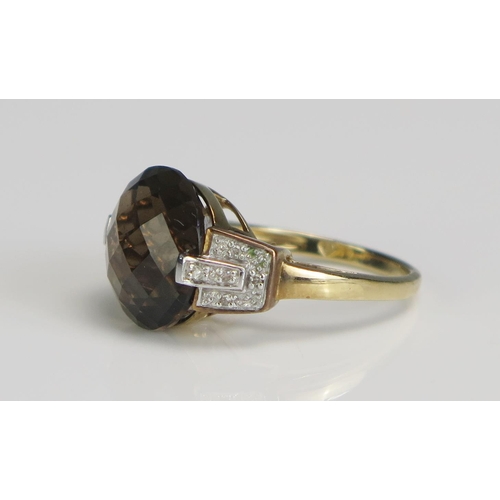 356 - A 9ct Gold, Smoky Quartz and Diamond Dress Ring13.8mm principal stone, size N, 5.3g