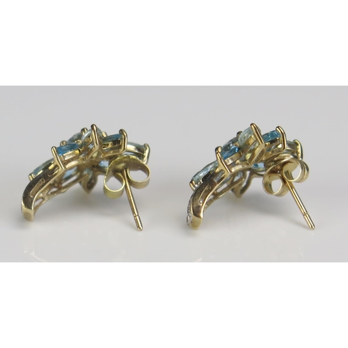 358 - A Pair of 9ct Gold, Aqua Marine or Topaz and Diamond Flower Head Earrings, 18.5mm drop, stamped 375,... 