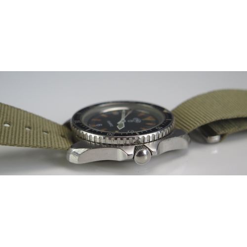 403 - A CWC Military Navy Divers Watch, the back no. 055.6645-99 7573314, crows foot, 313 95. Running