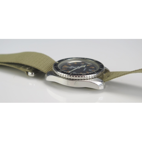 403 - A CWC Military Navy Divers Watch, the back no. 055.6645-99 7573314, crows foot, 313 95. Running