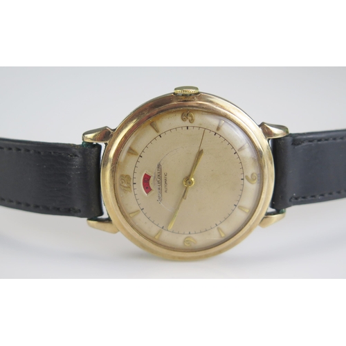 460 - A Jaeger LeCoultre Gent's 9ct Gold Automatic Wristwatch with power reserve, 29.9mm case, the back wi... 