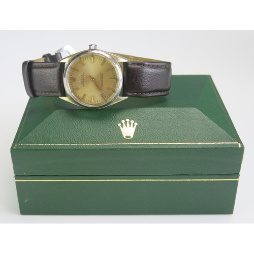 463 - A ROLEX Oyster Perpetual Steel and Gold Wristwatch, caliber 1520 movement, 28.5mm case. Boxed and ru... 