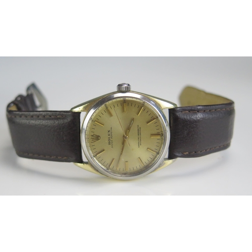 463 - A ROLEX Oyster Perpetual Steel and Gold Wristwatch, caliber 1520 movement, 28.5mm case. Boxed and ru... 